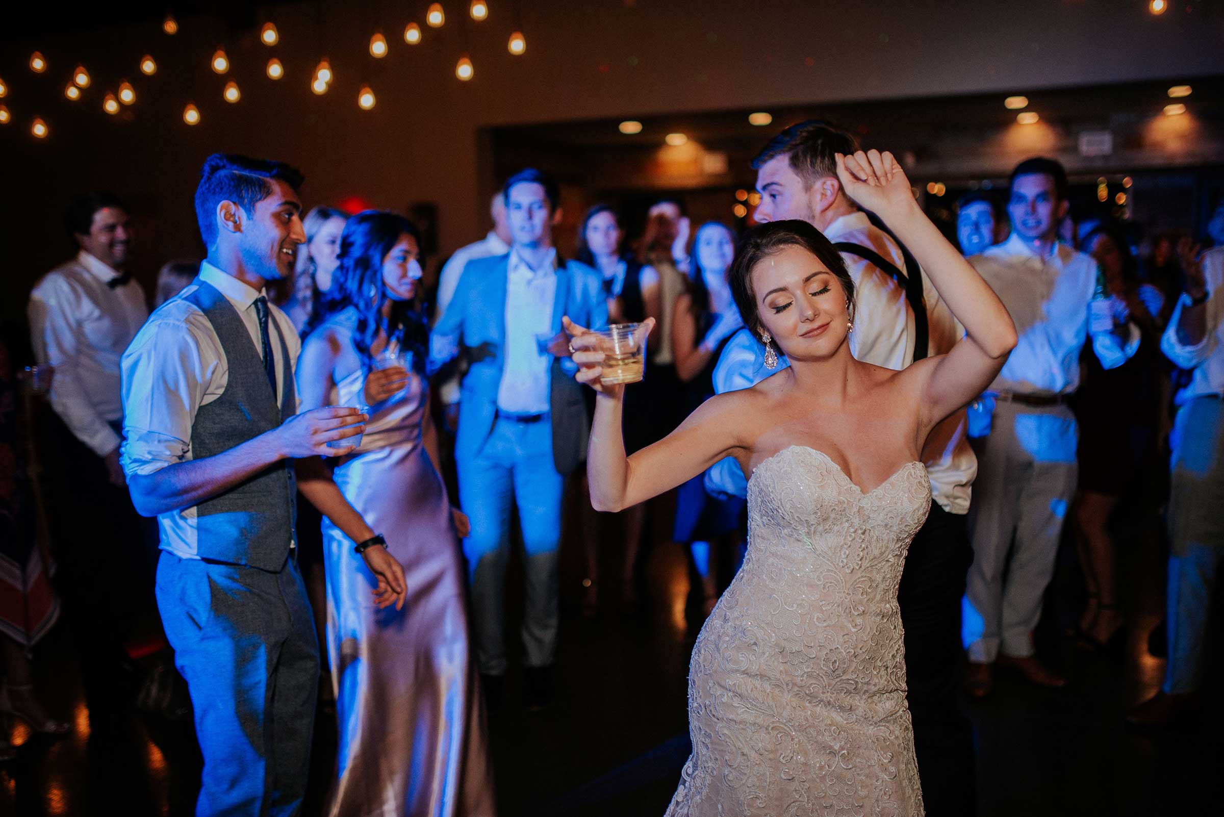 toast-wedding-DJ-bride-dancing-on-dance-floor