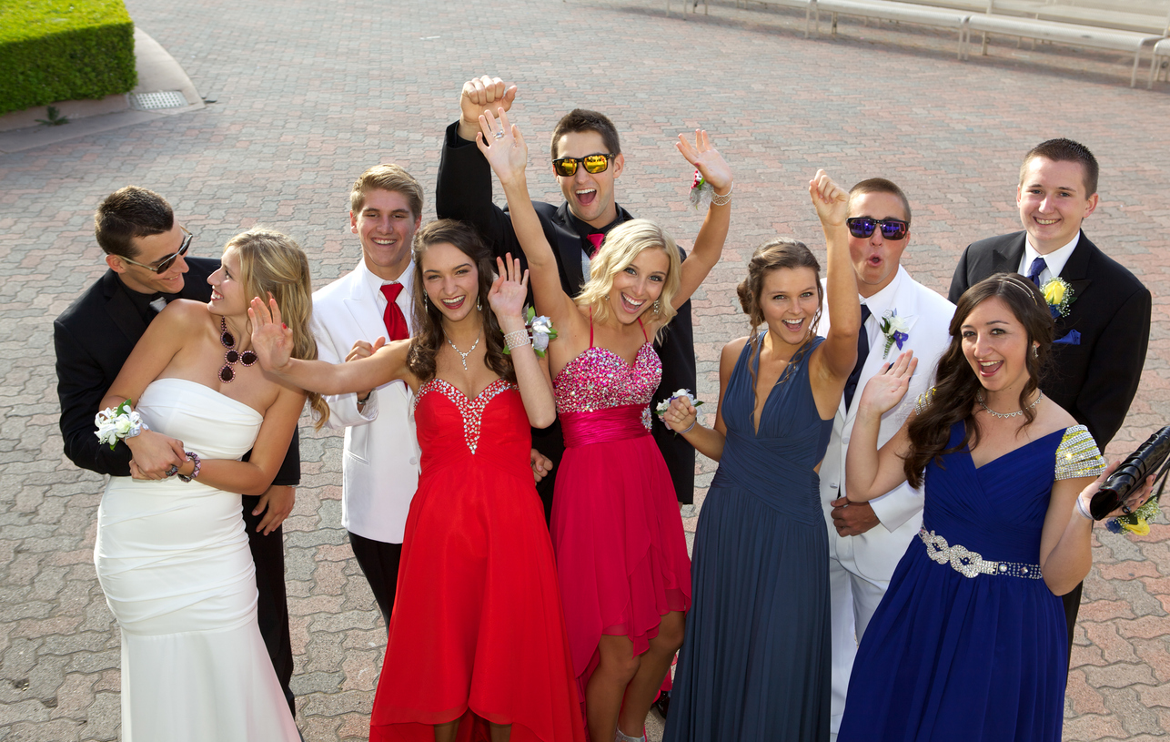 Group of Teenagers at the Prom Having Fun Posing Outdoors